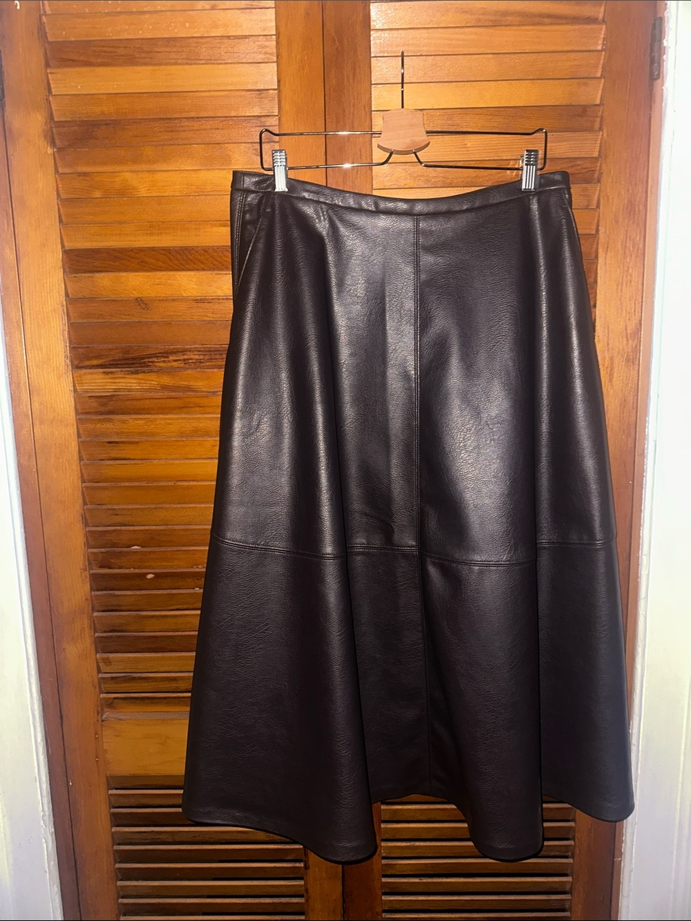 H & M edition Sleek a line silhouette. Full a line skirt.